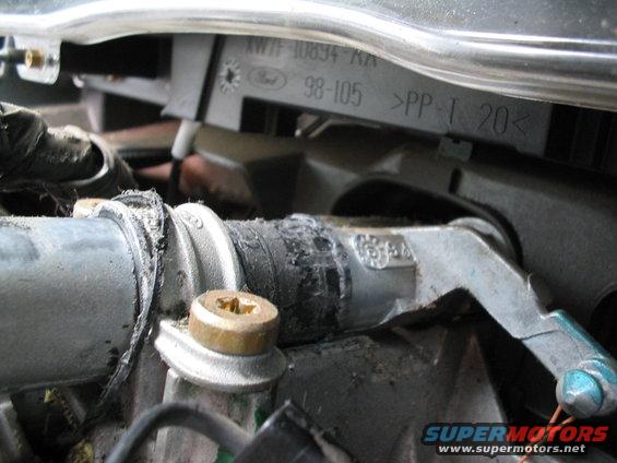 Bushing wore and then slid out of the housing. Wrapped it in electrical tape and reinstalled it. Made the shifter ALOT tighter, and alot less sloppy.