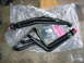 1992 Ford Mustang - New exhaust headers and gaskets are laid out on plastic sheeting.