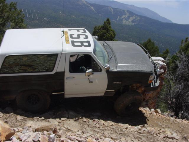 Ford Bronco with 'FSB' on the roof, driving off-road
