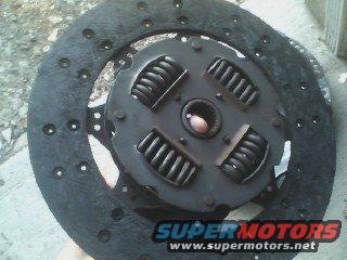 Clutch disc and pressure plate assembly. Supermotors.net logo visible