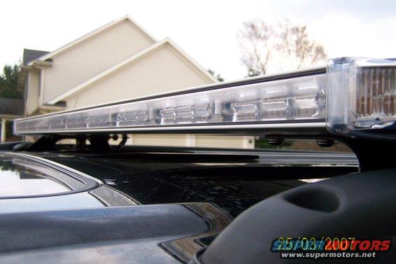 Light bar on black car roof with date stamp 25/03/2007
