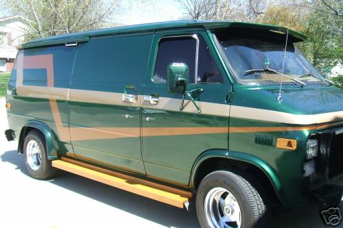 Green 1978 Ford E250 van, 3/4 front view, with gold stripe and running boards