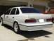 1995 Ford Taurus - Rear view of a white 1995 Ford Taurus SHO parked in a driveway.