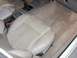 1995 Ford Taurus - Interior view showing the driver's seat, center console, and floor carpeting.