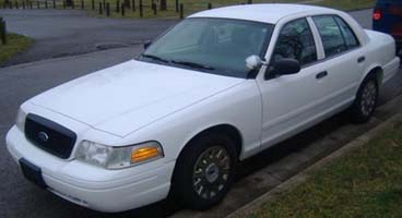 White 1996 Ford Crown Victoria sedan, 3q front view