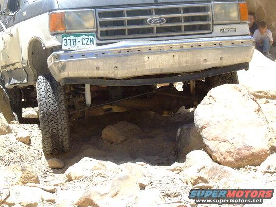 1987 Ford Bronco front grille and bumper on rocky terrain