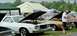 1976 Ford Ranchero - Multiple Ford Rancheros are displayed with hoods open at an outdoor event.
