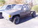 1989 Ford F-250 - This Toyota pickup truck is missing its rear end and bed, showing only the chassis and cab.