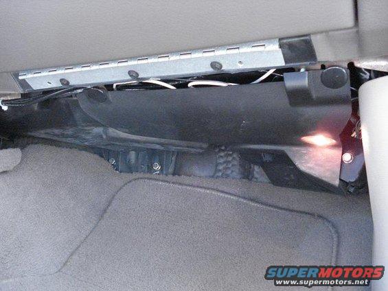 Interior paneling and wiring under a dashboard