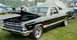 1976 Ford Ranchero - Black 1966 Ford Fairlane 500 coupe utility with chrome wheels and hood up.