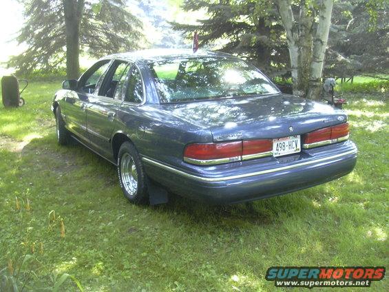 Dark blue 1996 Ford Crown Victoria rear view. License plate 498-HCV