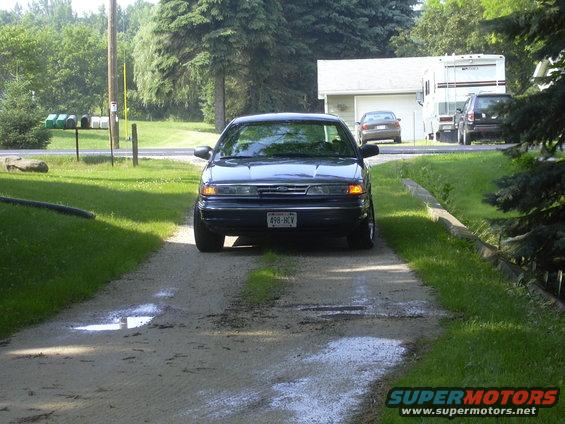 1996 Ford Crown Victoria front view on a gravel driveway