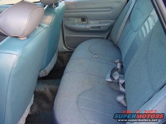 Blue fabric rear seat and light blue vinyl front seat in a 2003 Ford Crown Victoria