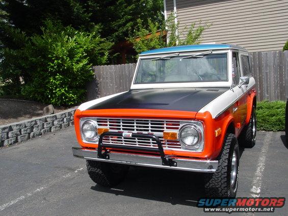 1973 Ford Bronco front view with orange grille surround and black hood