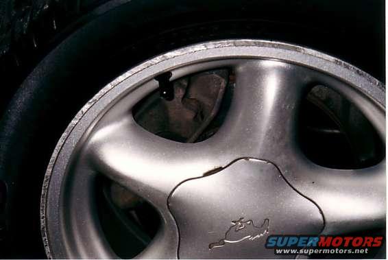 Curb rash on front right wheel