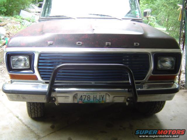 1979 Ford Bronco front view with blue grille and bull bar