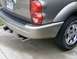 2004 Dodge Durango - The rear of a 2004 Dodge Durango shows its dual exhaust pipes and trailer hitch.