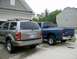 2004 Dodge Durango - Rear view of a 2004 Dodge Durango parked next to a blue Dodge Ram pickup truck.