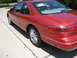 1996 Lincoln Mark VIII - This 1996 Lincoln Mark VIII is shown from the rear 3/4 angle. A sticker with the number 06270 is visible on the rear window.