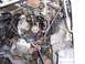 1971 Porsche 914 - Close-up view of an engine bay, a carburetor and alternator.