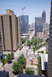 1996 Ford Bronco - Aerial view of a city street with urban architecture and green spaces.