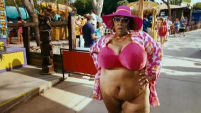 Woman in pink bikini and hat