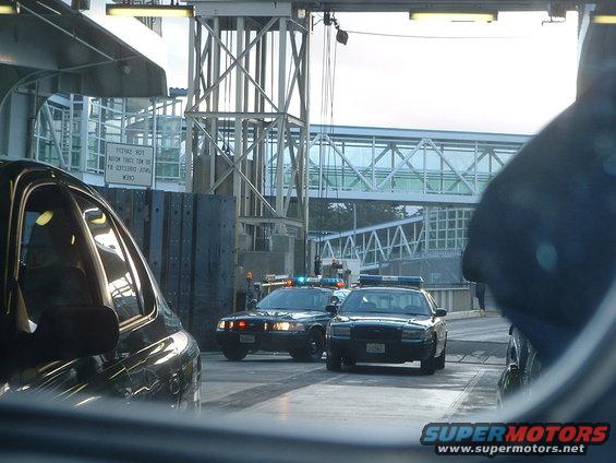 Kitsap County Sheriff deputies on ferryboat in Kingston (rearview mirror)