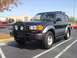 1997 Toyota Land Cruiser - This 1997 Toyota Land Cruiser is seen from a three-quarter front angle in a parking lot.