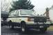1990 Ford Bronco - This 1987 Ford Bronco is shown from a three-quarter front angle, parked outdoors.