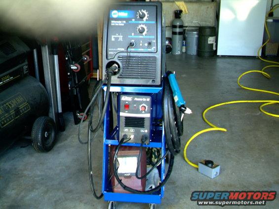 Miller 170 welder and ESAB Power Cut 45 plasma cutter on a blue cart with yellow cables