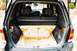 2002 Ford Escape - THe box was fiberglassed in the tire well. so it uses space very well!