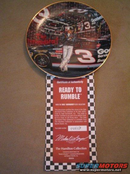 Collectible plate showing Dale Earnhardt's #3 race car and him standing next to it. Includes a certificate of authenticity