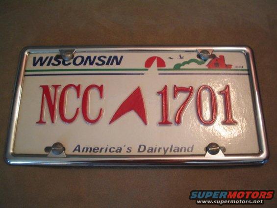 Wisconsin license plate with red lettering NCC 1701 and "America's Dairyland" text