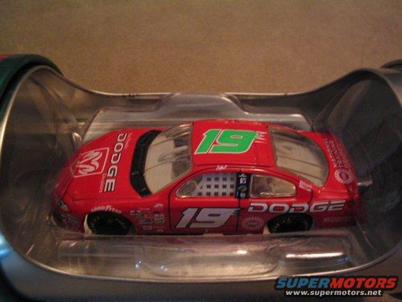 Red Dodge race car with number 19, in packaging