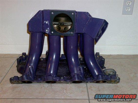 intake-1.jpg The new intake.  Got it from a guy who got it from a guy.  Off of a factory intake, so I can keep factory fuel rails and heads.  This thing should move some serious air!