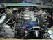 1997 Ford Ranger - Custom diesel engine build a turbocharger and intricate fuel line routing, with "Outlaw Diesel" branding.