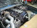 1997 Ford Ranger - Custom diesel engine swap in a vehicle, a prominent turbocharger and intricate fuel line routing. The "DIESEL" branding is visible.