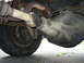 1994 Ford Bronco - Undercarriage view of a vehicle's rear differential and driveshaft, with visible rust and wear.