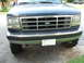 1994 Ford Bronco - The grille design and headlights suggest this Ford truck is from the early to mid-1990s, likely a F-Series.