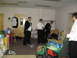 1988 Ford Bronco - Men dressed in formal attire gather in a room before an event.