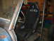 1992 Ford Mustang - A racing seat is installed in a custom vehicle, likely undergoing modifications or completed modification.