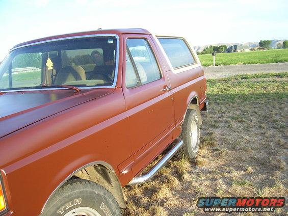 Red 1990 Ford Bronco 3/4 front view