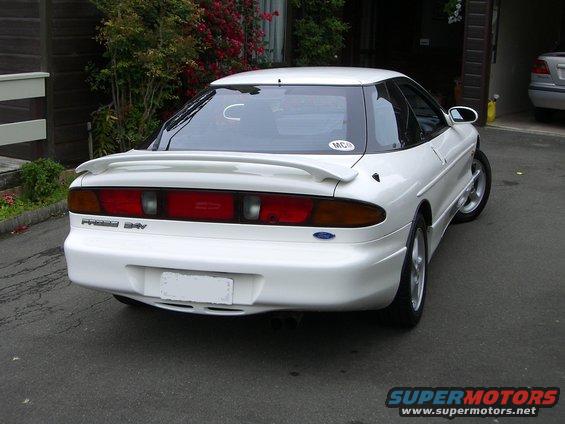 1995 Ford Probe rear view, white paint, spoiler, tinted rear window with sticker