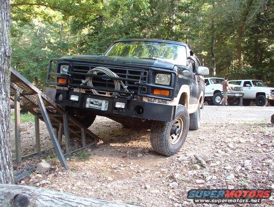 05ramp.jpg These pics are even more interesting now, in hindsight.  My bumpers kept me from even really getting ON the ramp, but they didn't interfere with anything on the trails.

That's Jason in the background walking in front of Ben's truck to his Blazer.