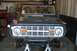 1992 Ford Mustang - This 1974 Ford Bronco is in the process of being modified, a visible roll cage and custom front bumper.