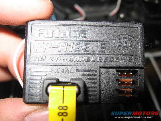 Black Futaba AM 2 channel receiver with yellow tape showing '-88'