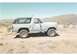 1984 Ford Bronco - The passenger side still bears some battle wounds from a few winters ago.