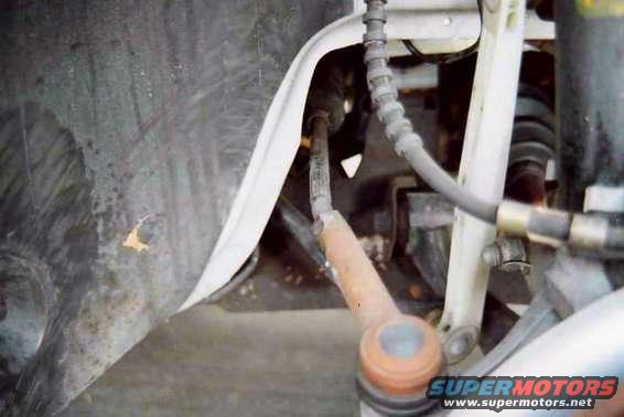 My bent right side tie-rod connector.  Bent right at the weak point, just as expected.  Another 50 bucks too. Grrrr.