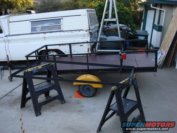 garage-shelf.jpg here is another bed rail project. i needed a shelf to hold holiday decor. we got a ton and the current 2 shelf wire rack is not working. i going to put in a chunk of sub floor and be done. Here is the main box frame