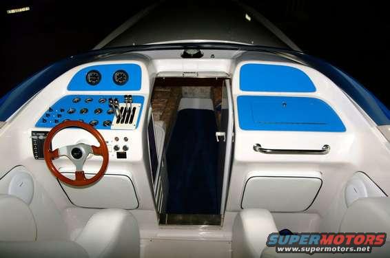 must be british. steering is on the wrong side of the boat!!